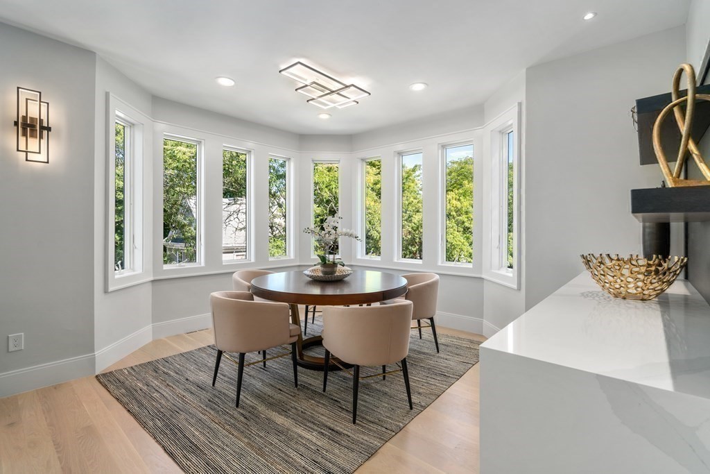 89 University Road Brookline, MA 02445 - Photo 12 of 41 a view of a dining room with furniture window and outside view