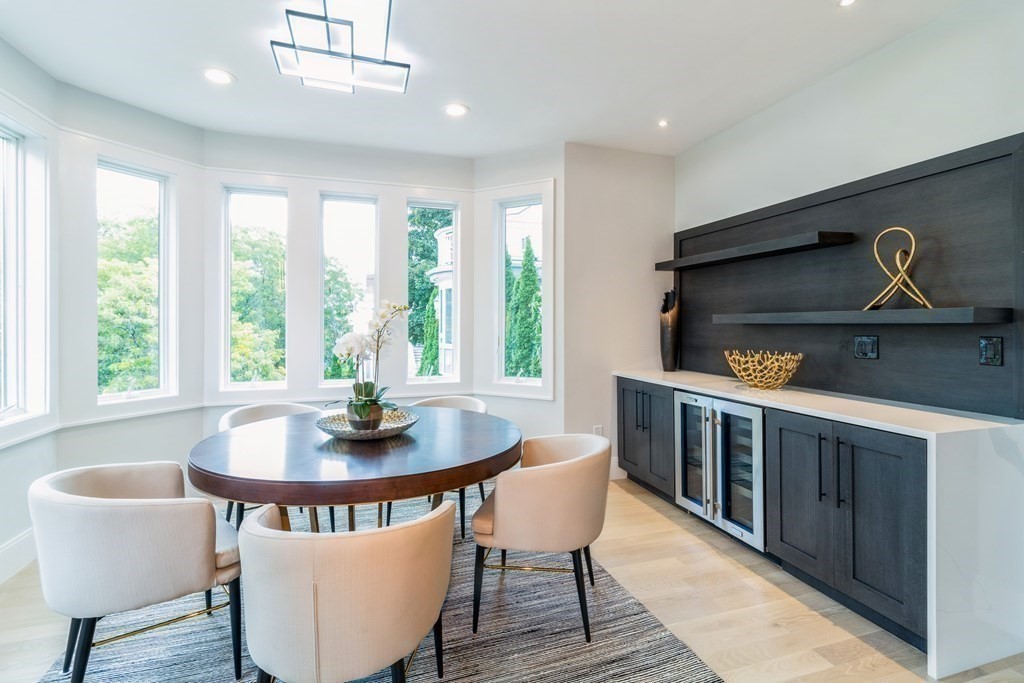 89 University Road Brookline, MA 02445 - Photo 13 of 41 a dining room with furniture and window