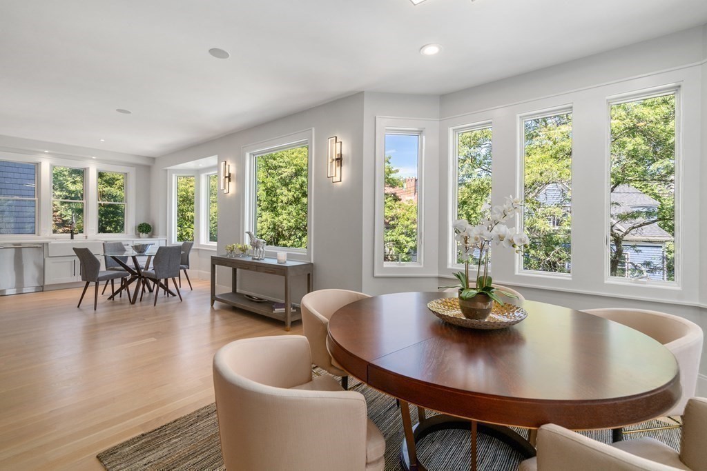 89 University Road Brookline, MA 02445 - Photo 15 of 41 a view of a dining room with furniture window and outside view