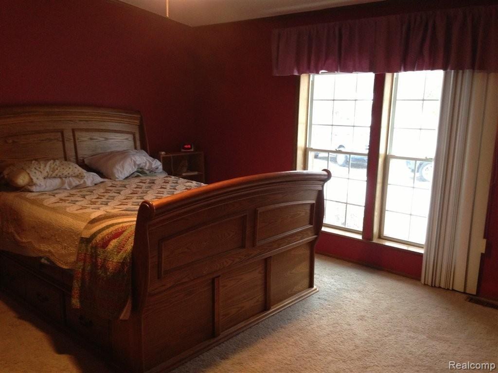 9166 Newburgh Road Livonia, MI 48150 - Photo 7 of 12 master bedroom