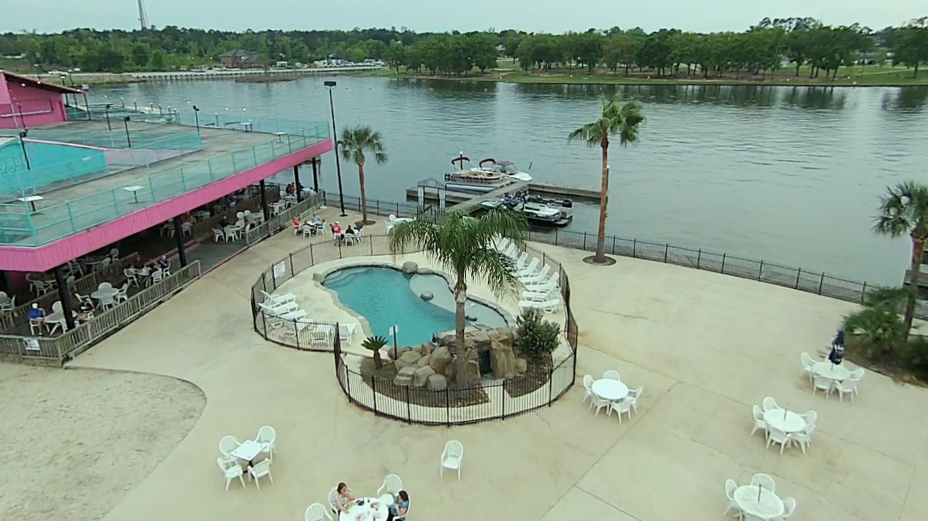 403 Black Walnut Drive Conroe, TX 77304 - Photo 15 of 15 a view of a wooden floor with a lake