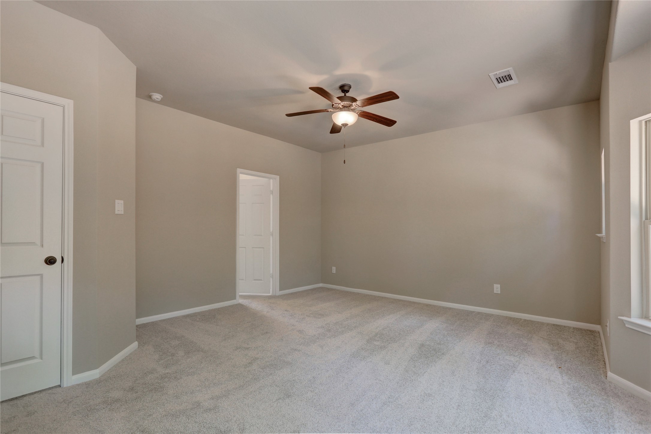 403 Black Walnut Drive Conroe, TX 77304 - Photo 4 of 15 a view of a big room with carpet