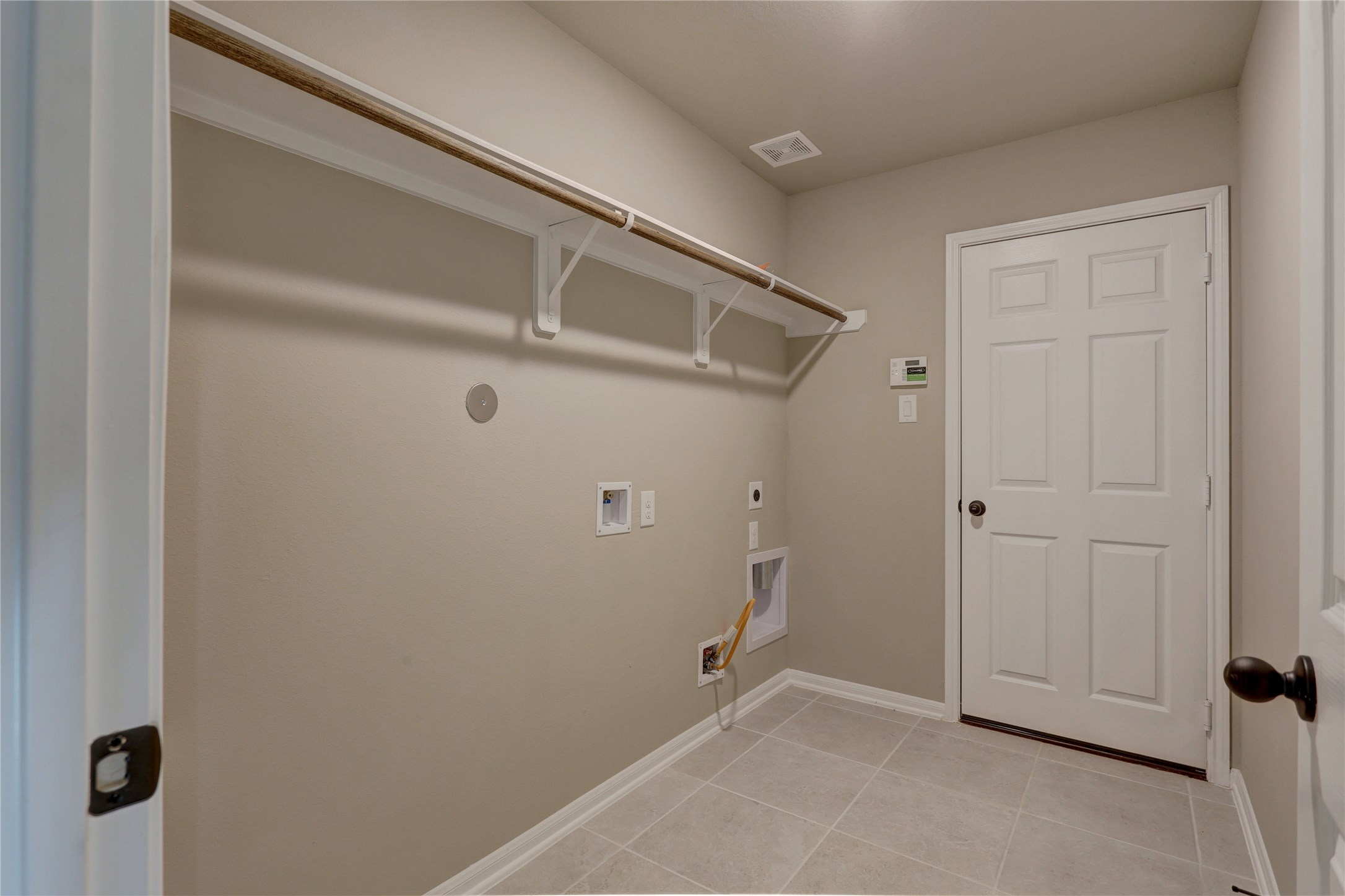 403 Black Walnut Drive Conroe, TX 77304 - Photo 9 of 15 a view of room with white walls