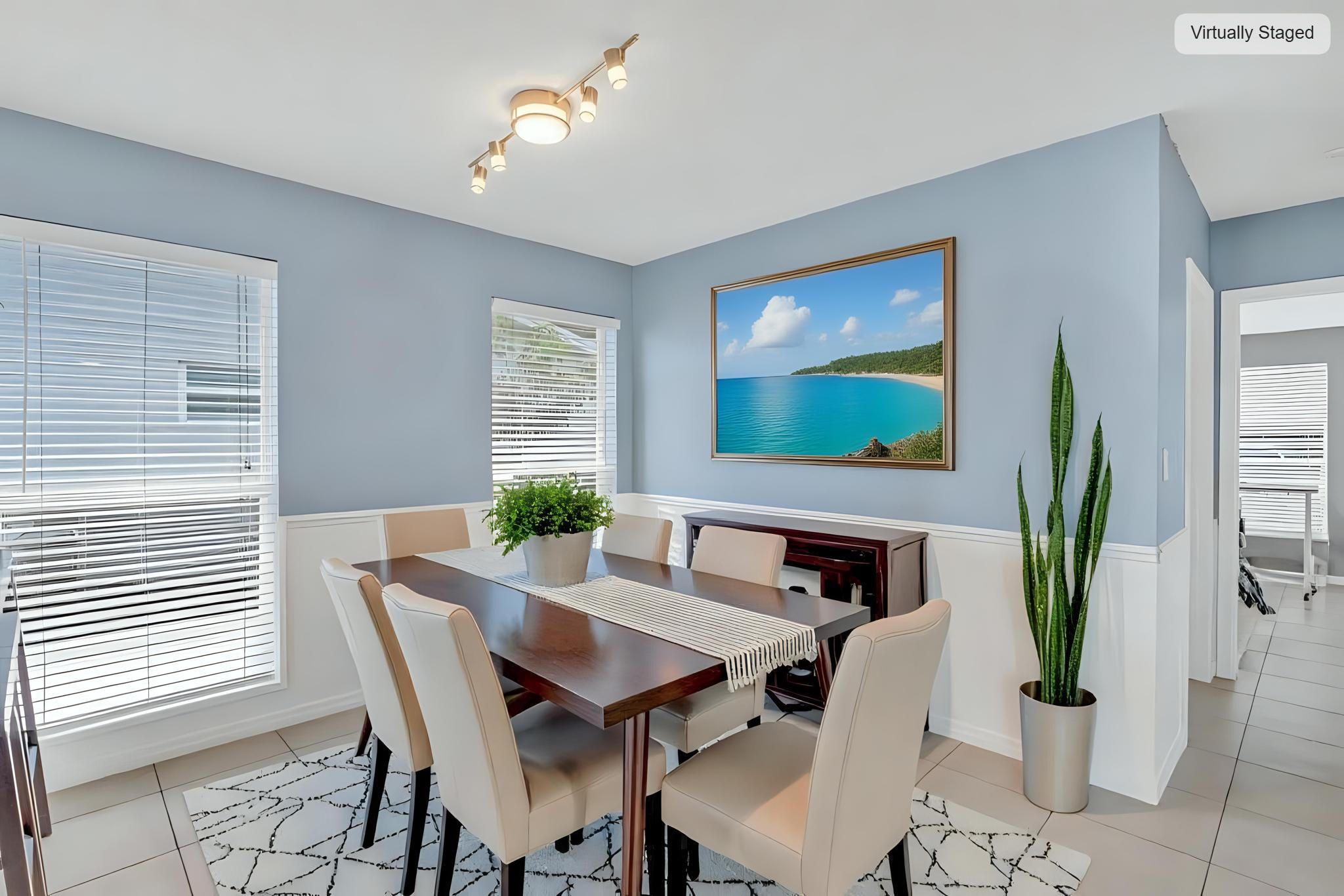 304 2nd Terrace Key Largo, FL 33037 - Photo 13 of 43 a view of a dining room with furniture window and wooden floor