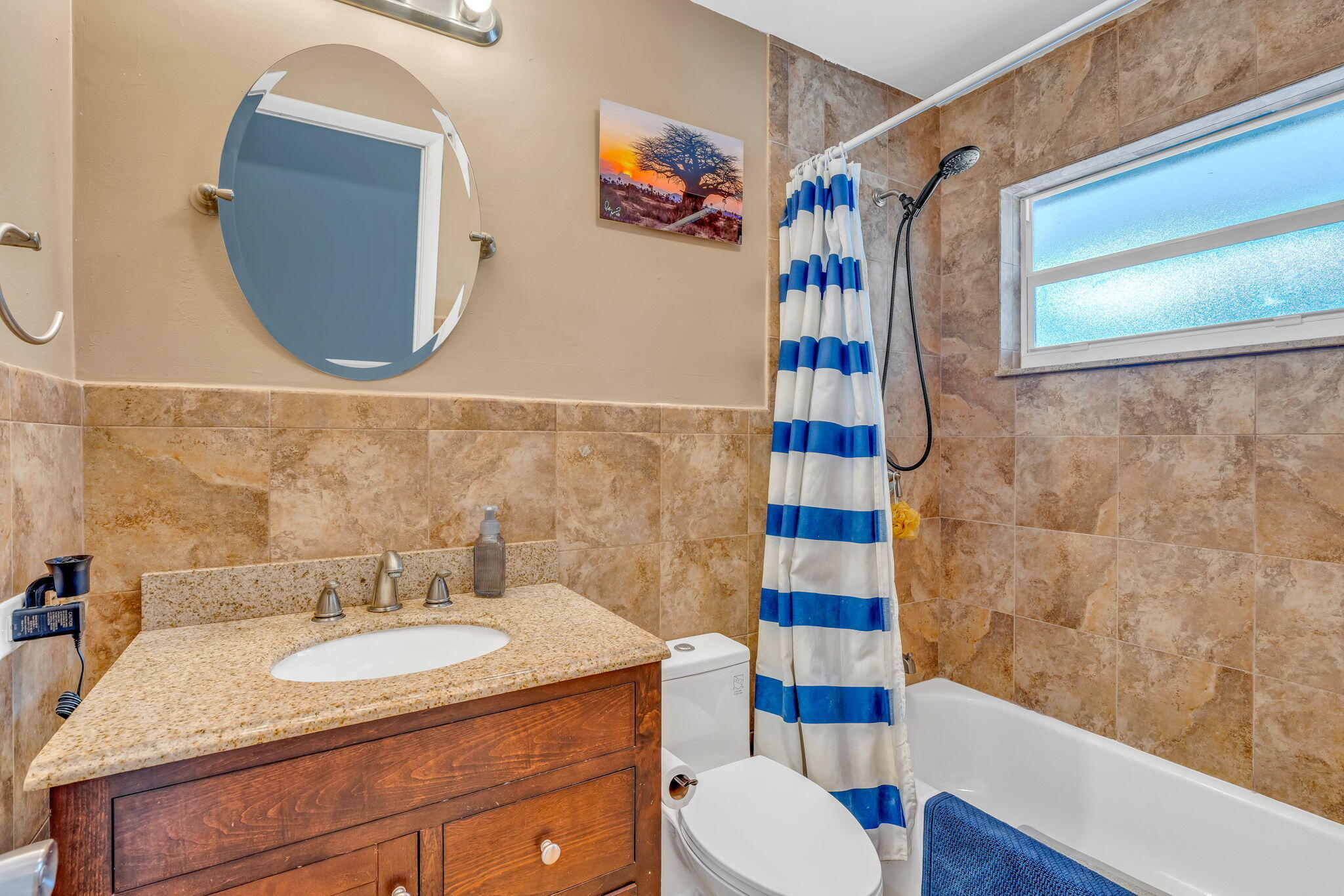 304 2nd Terrace Key Largo, FL 33037 - Photo 27 of 43 a bathroom with a sink toilet and shower
