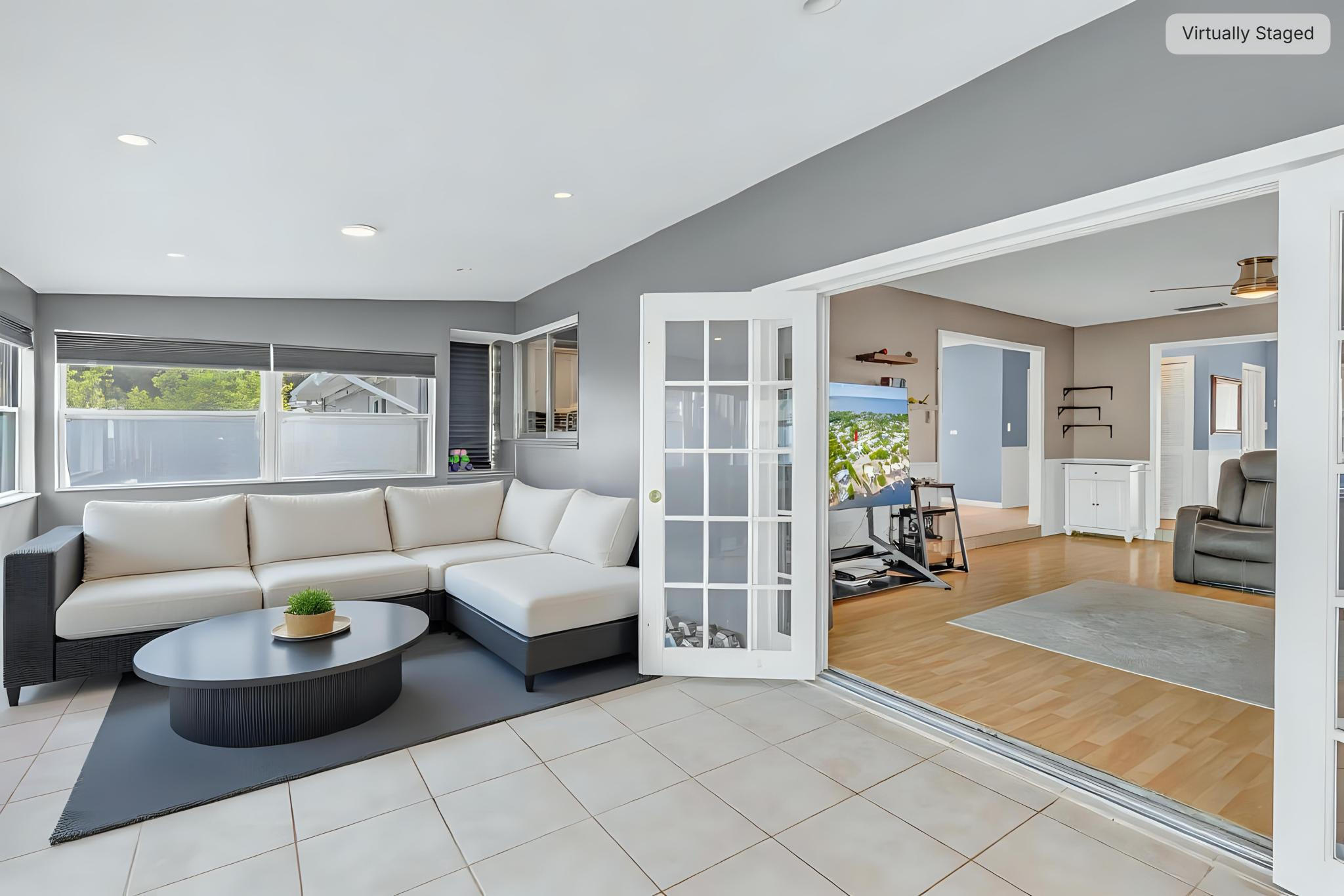 304 2nd Terrace Key Largo, FL 33037 - Photo 30 of 43 a living room with furniture and a table