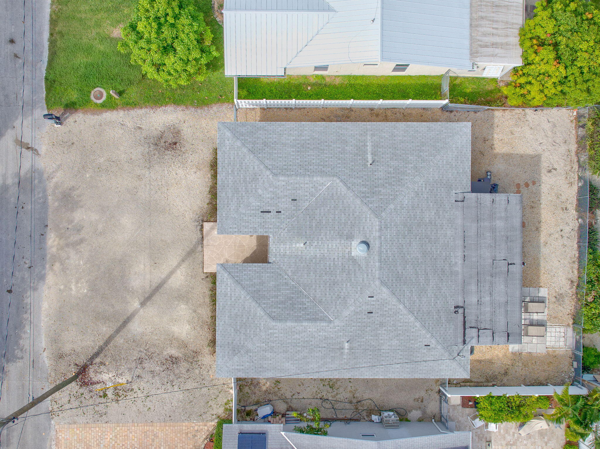 304 2nd Terrace Key Largo, FL 33037 - Photo 40 of 43 an aerial view of a house with a yard