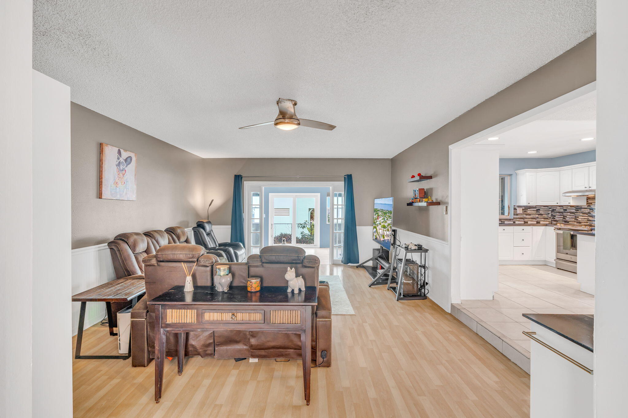 304 2nd Terrace Key Largo, FL 33037 - Photo 10 of 43 a living room with furniture and a wooden floor