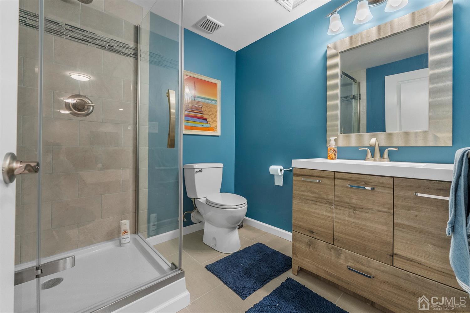 308 Plainfield Road Edison, NJ 08820 - Photo 11 of 40 a bathroom with a sink a toilet and shower