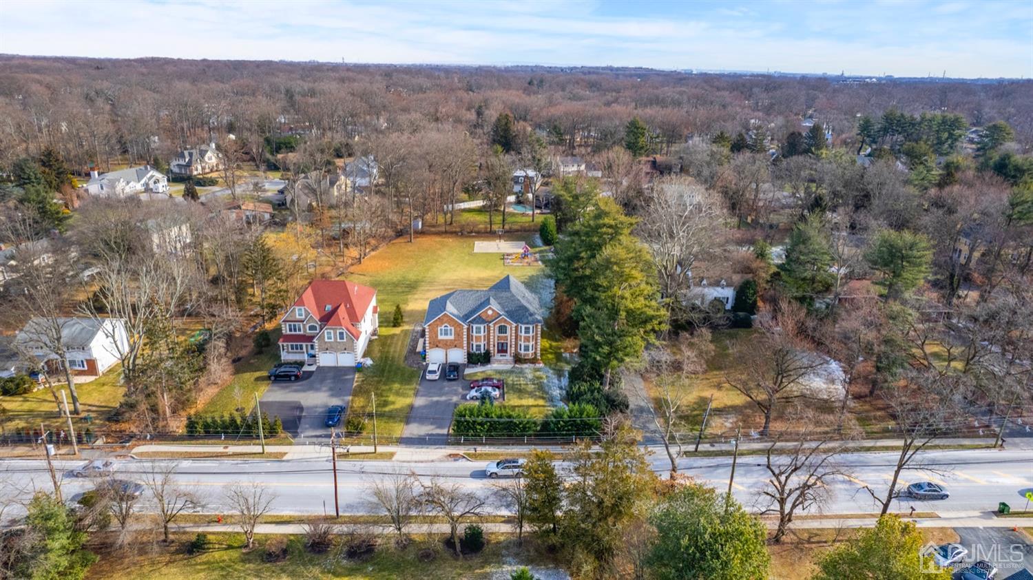 308 Plainfield Road Edison, NJ 08820 - Photo 2 of 40 an aerial view of residential houses with outdoor space and swimming pool