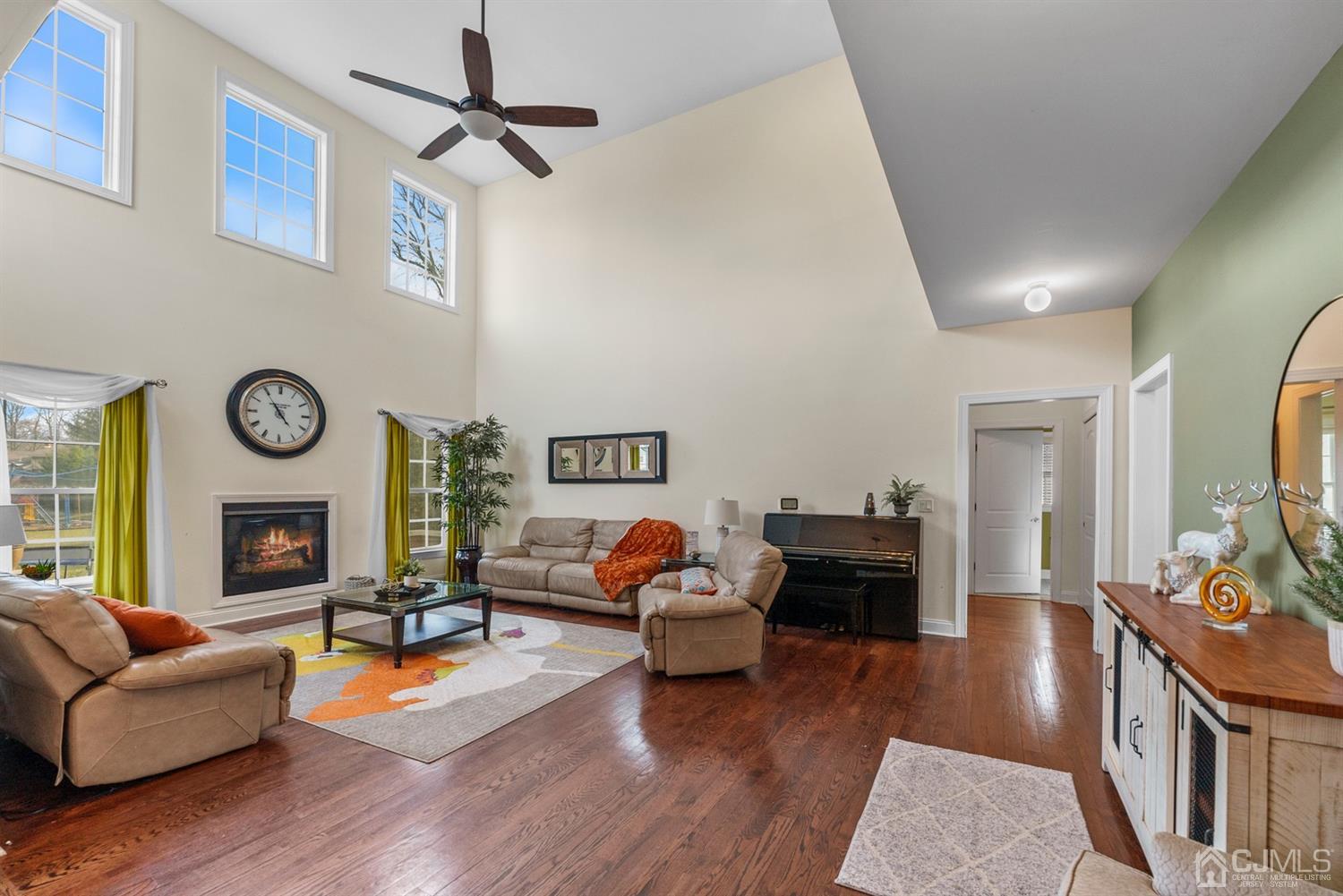 308 Plainfield Road Edison, NJ 08820 - Photo 21 of 40 a living room with furniture and a fireplace