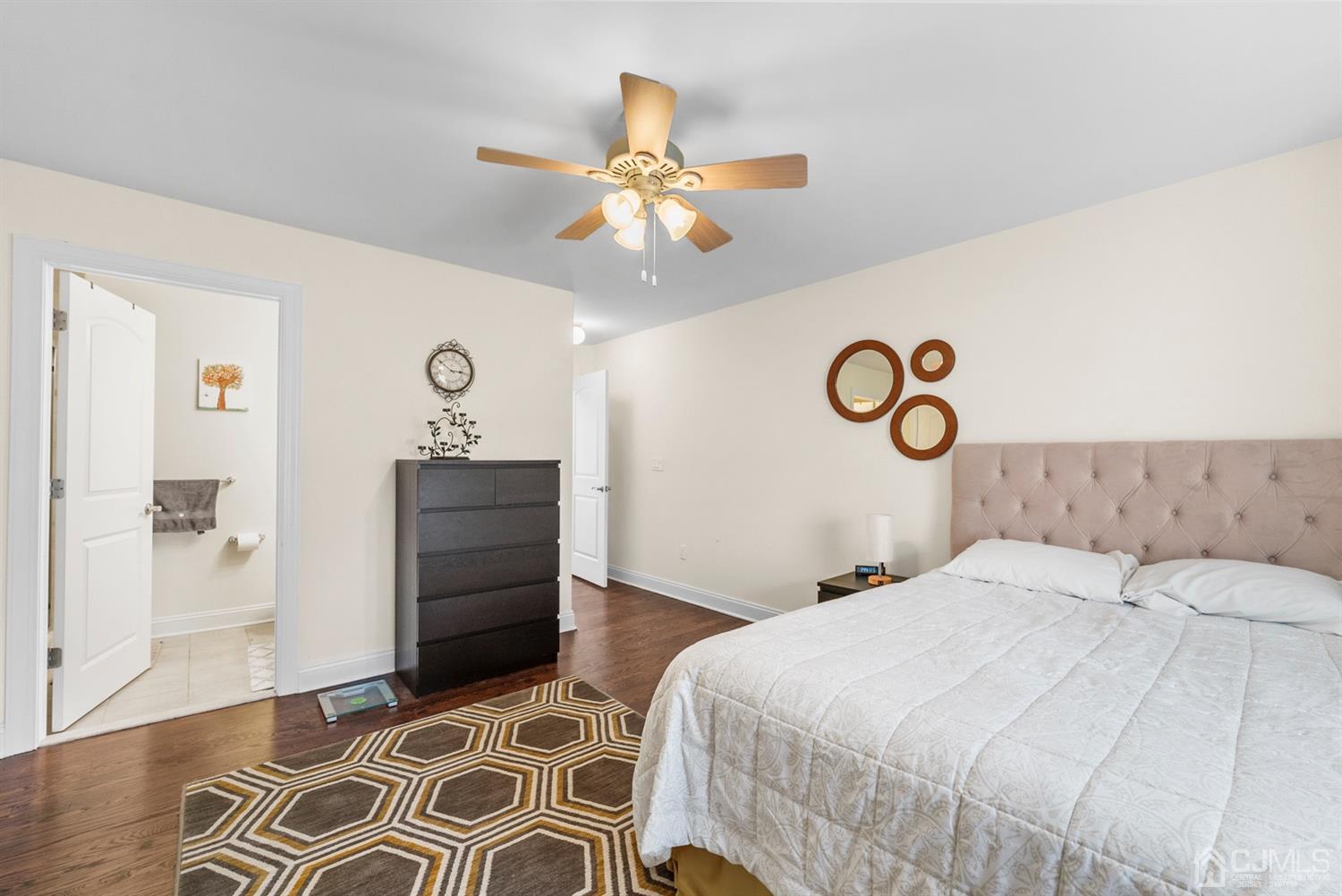 308 Plainfield Road Edison, NJ 08820 - Photo 34 of 40 a bedroom with a bed and wooden floor