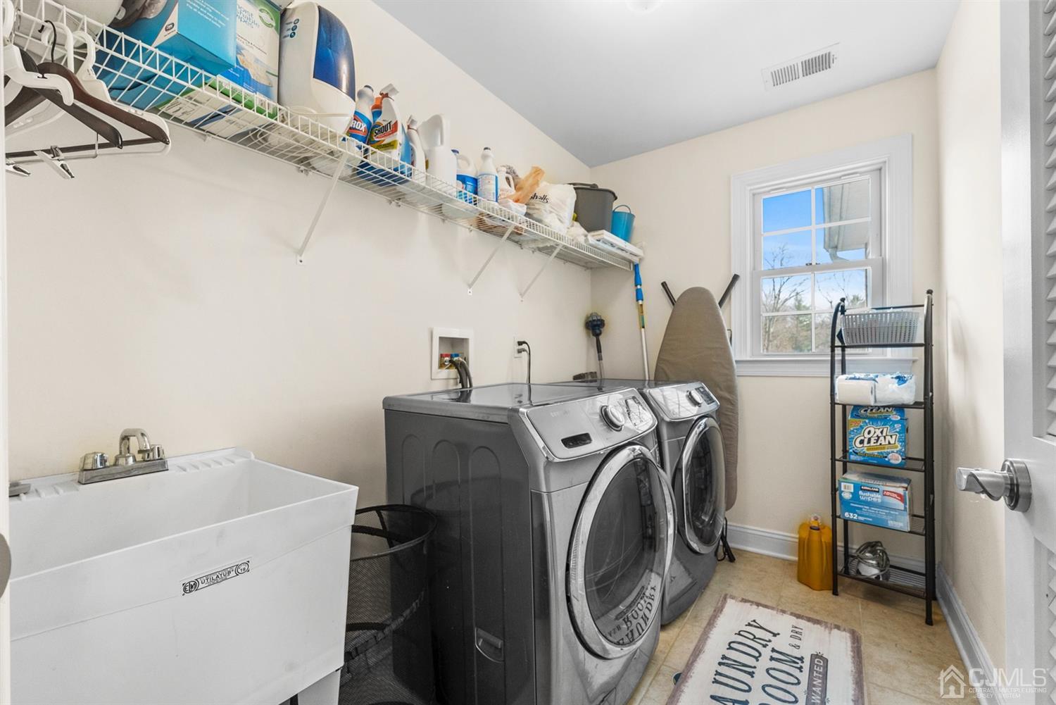 308 Plainfield Road Edison, NJ 08820 - Photo 35 of 40 a utility room with dryer and washer