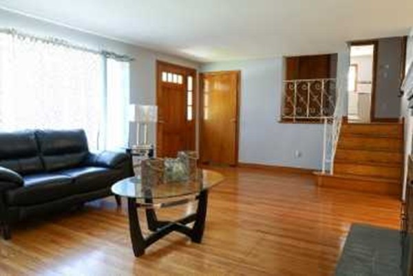1 Standish Road Lawrence, MA 01843 - Photo 5 of 13 a living room with furniture and wooden floor