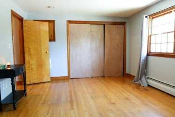 1 Standish Road Lawrence, MA 01843 - Photo 8 of 13 wooden floor in an empty room with a window