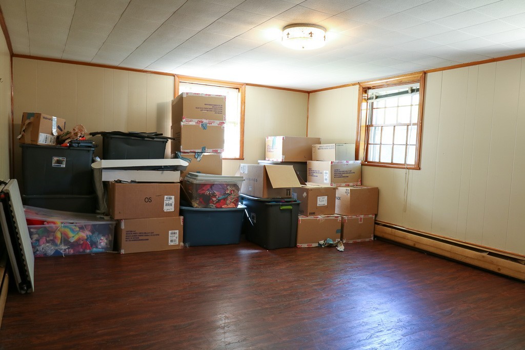 1 Standish Road Lawrence, MA 01843 - Photo 10 of 13 a living room with furniture and a fireplace