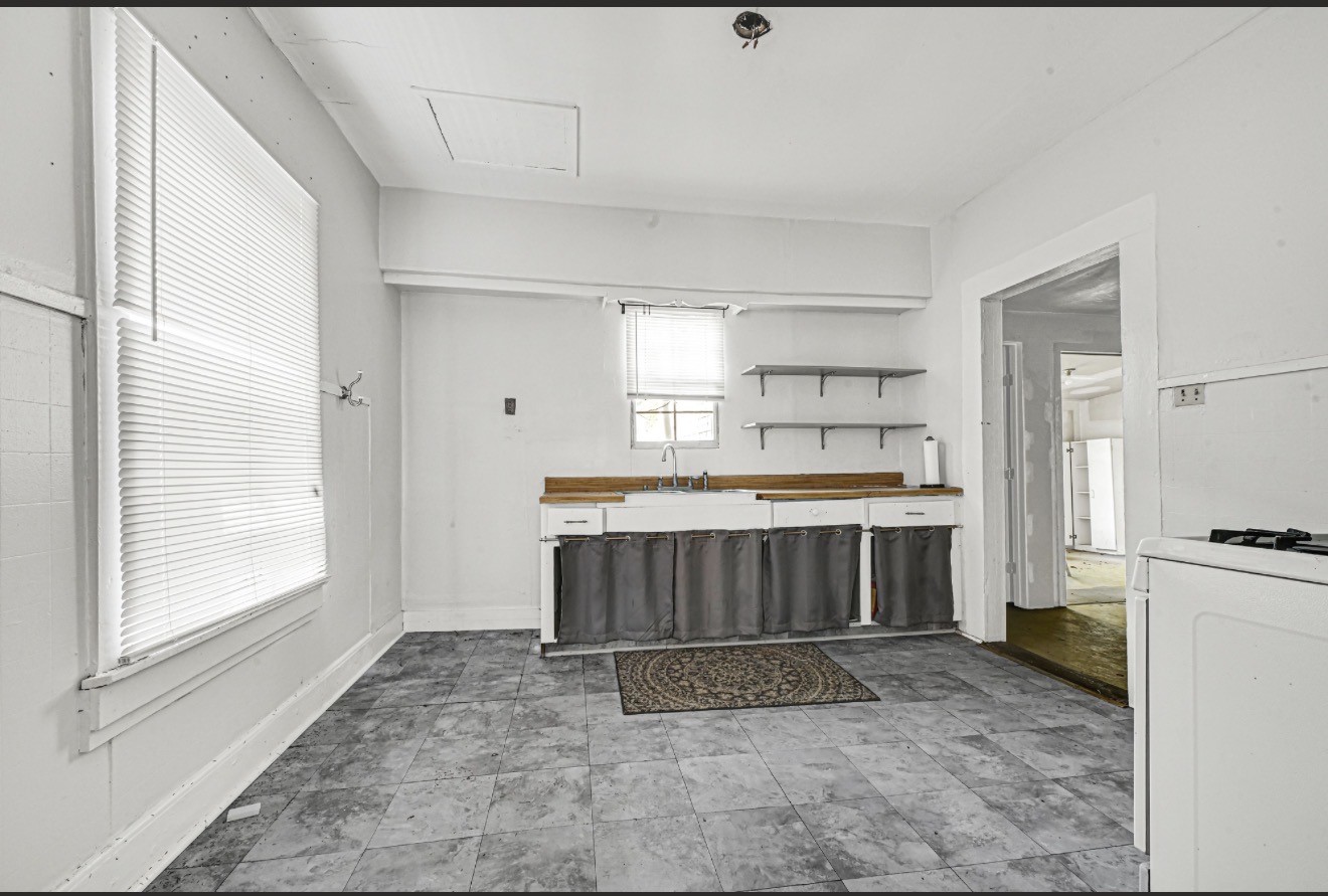 209 Frawley Street Houston, TX 77009 - Photo 17 of 21 a view of kitchen with furniture and window