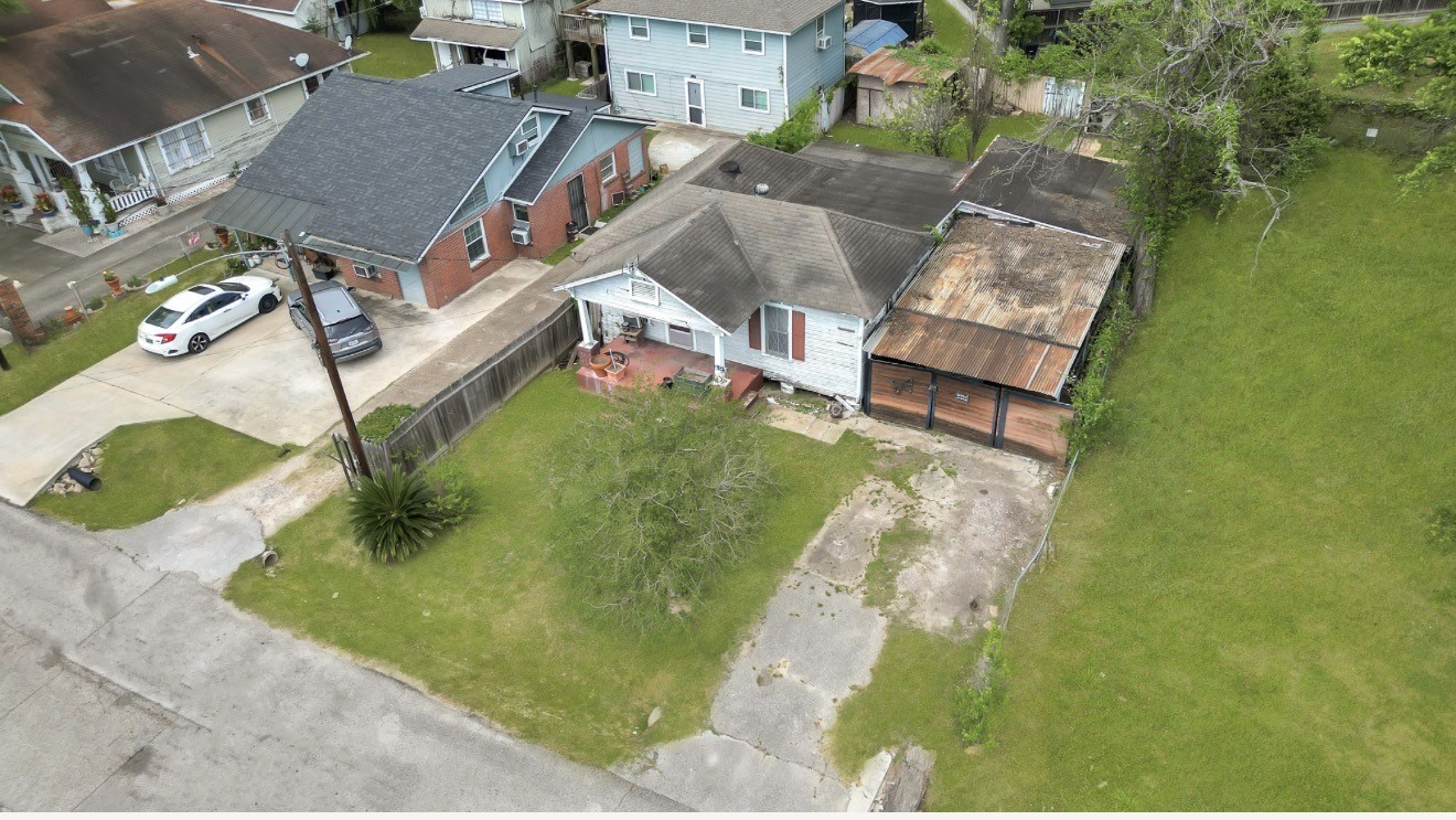 209 Frawley Street Houston, TX 77009 - Photo 4 of 21 an aerial view of a house with garden space and street view