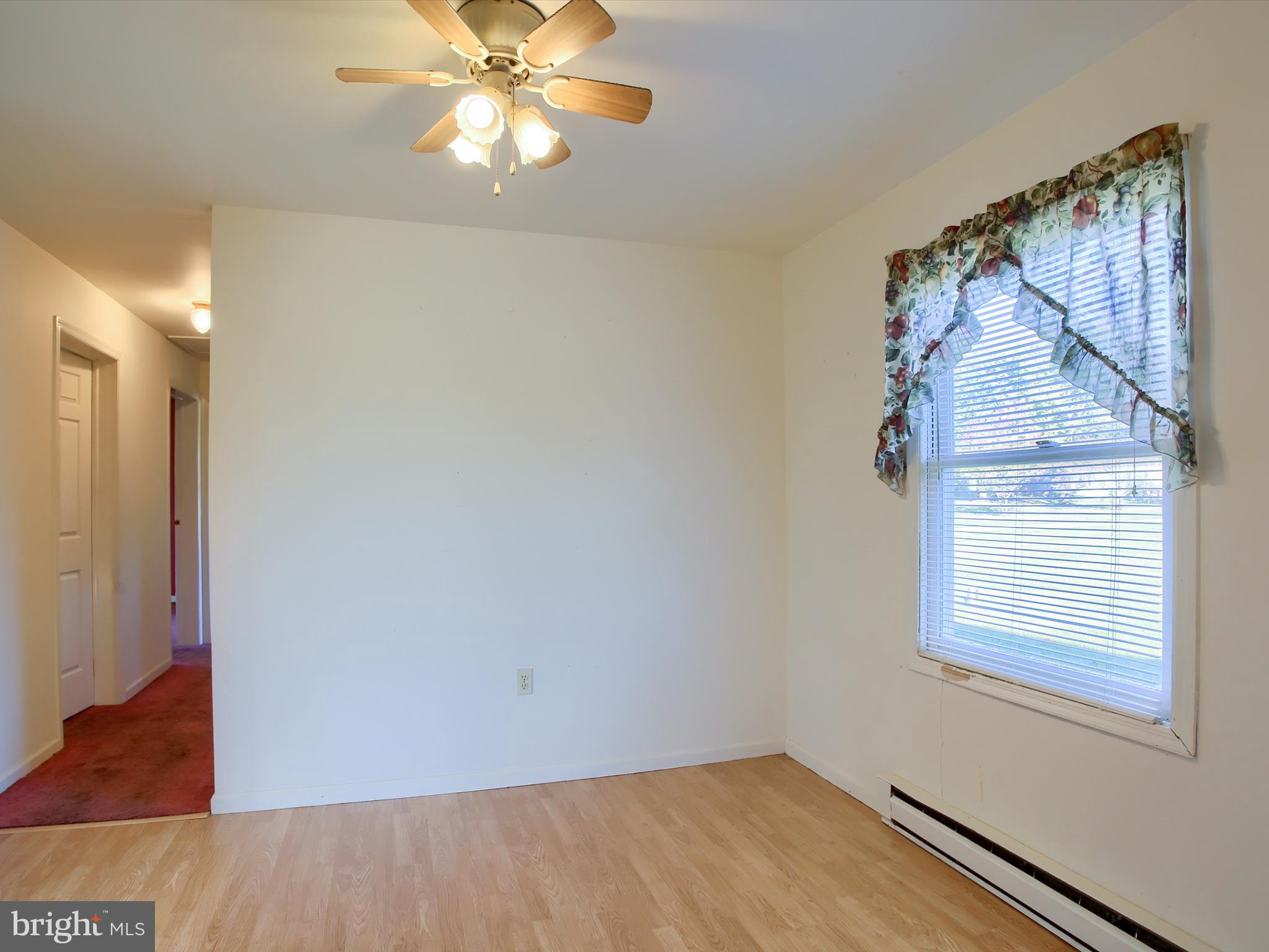 151 Oak Flat Road Newville, PA 17241 - Photo 19 of 33 an empty room with windows and fan