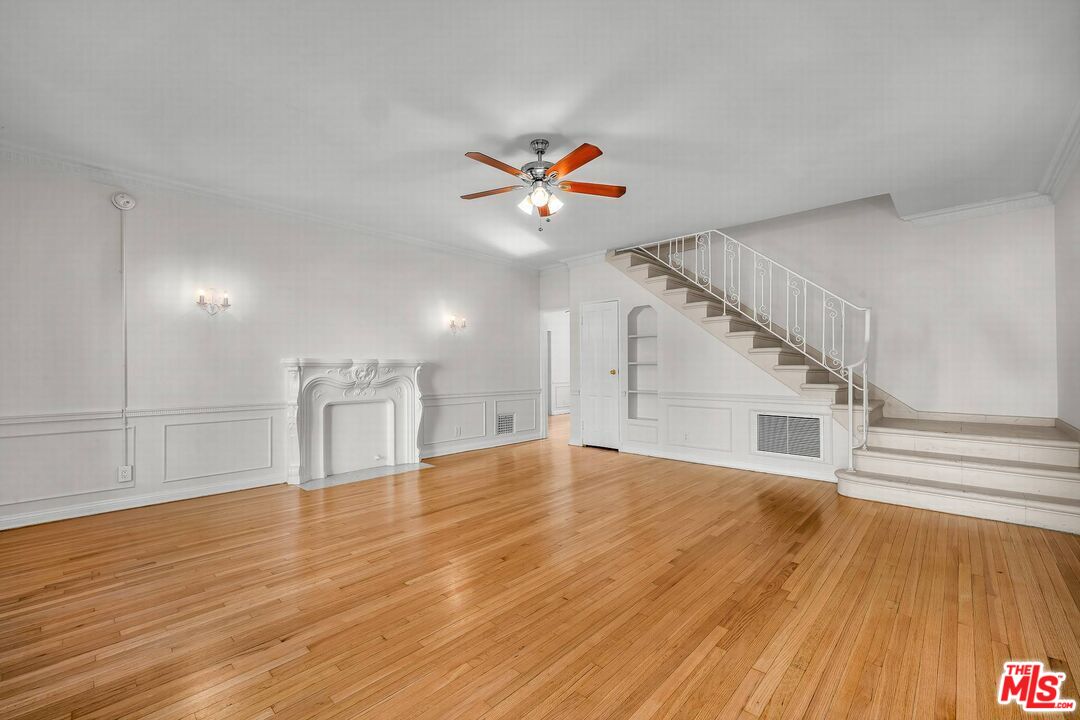614 Midvale Avenue Los Angeles, CA 90024 - Photo 15 of 18 a view of empty room with wooden floor