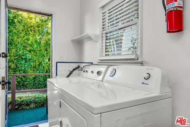 a view of utility room with washer and dryer