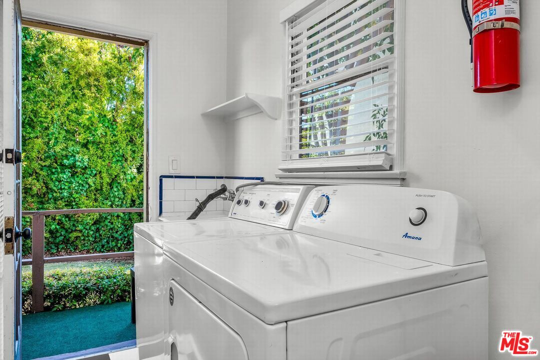 614 Midvale Avenue Los Angeles, CA 90024 - Photo 8 of 18 a view of utility room with washer and dryer