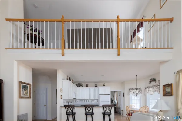 a kitchen with furniture and window
