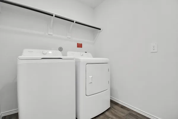a utility room with dryer and washer