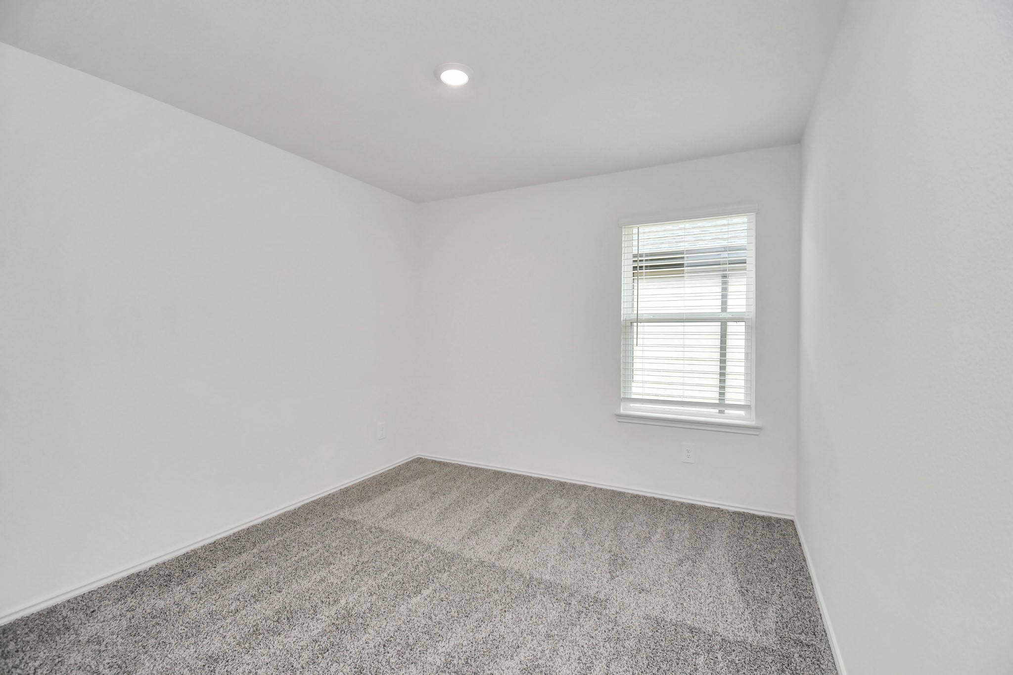 3822 Zoeys Way Fulshear, TX 77423 - Photo 24 of 37 an empty room with a window