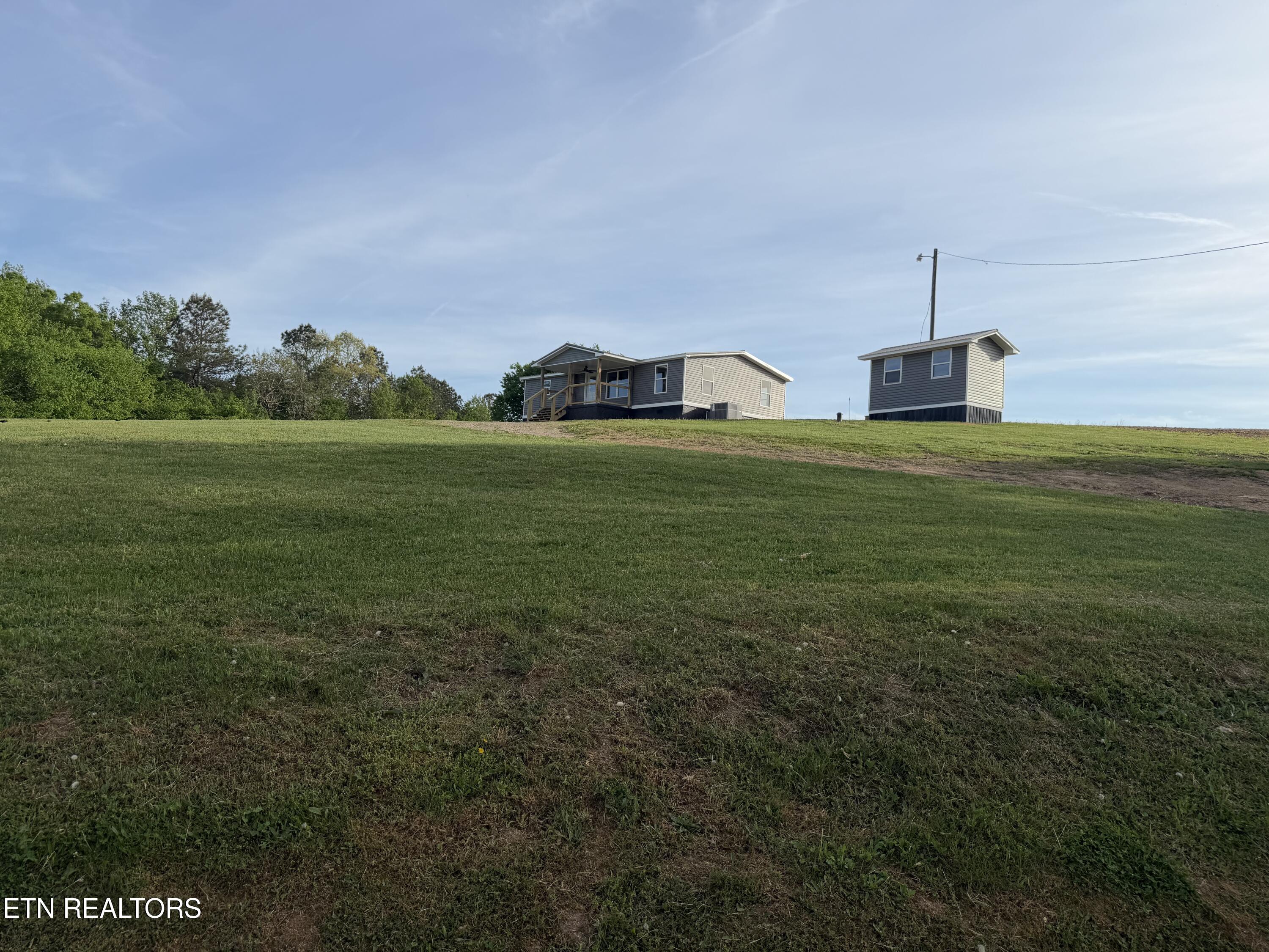 33633 Pond Creek Road Philadelphia, TN 37846 - Photo 17 of 20 Home from front from a distance!