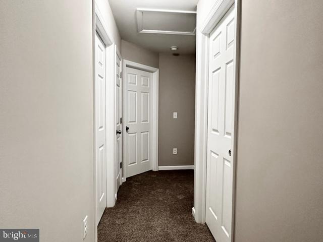 1245 Old Lake Road Newfield, NJ 08344 - Photo 20 of 34 a view of a hallway with closet and a black door