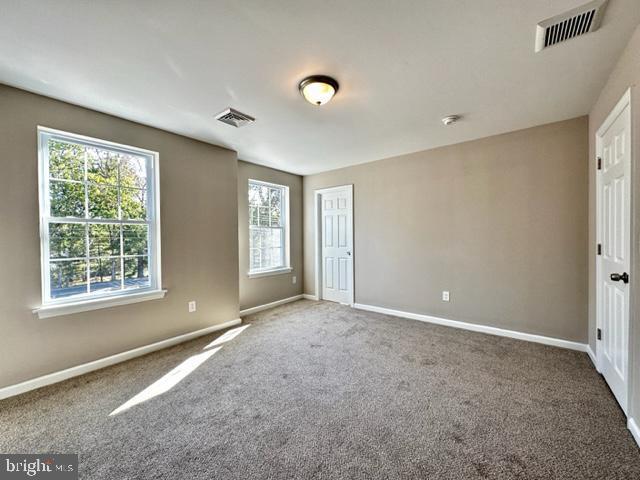 1245 Old Lake Road Newfield, NJ 08344 - Photo 21 of 34 a view of an empty room with a window