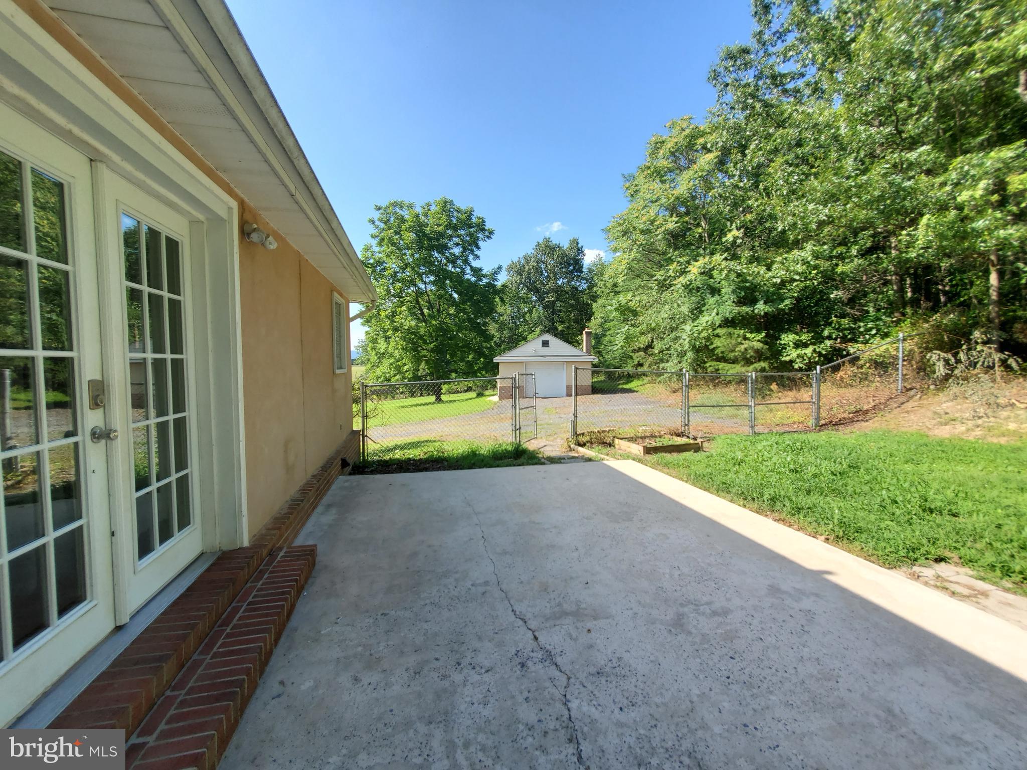14421 Winchester Grade Road Berkeley Springs, WV 25411 - Photo 12 of 44 Back Patio