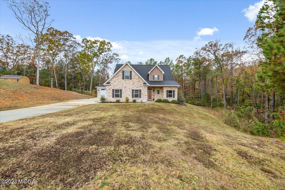 208 Carters Way Forsyth, GA 31029 - Photo 1 of 22 a view of a house with a yard