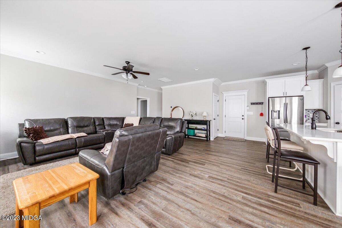 208 Carters Way Forsyth, GA 31029 - Photo 4 of 22 a living room with furniture and a table