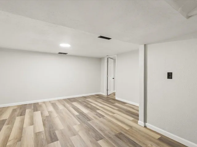 a view of a room that has a window in it