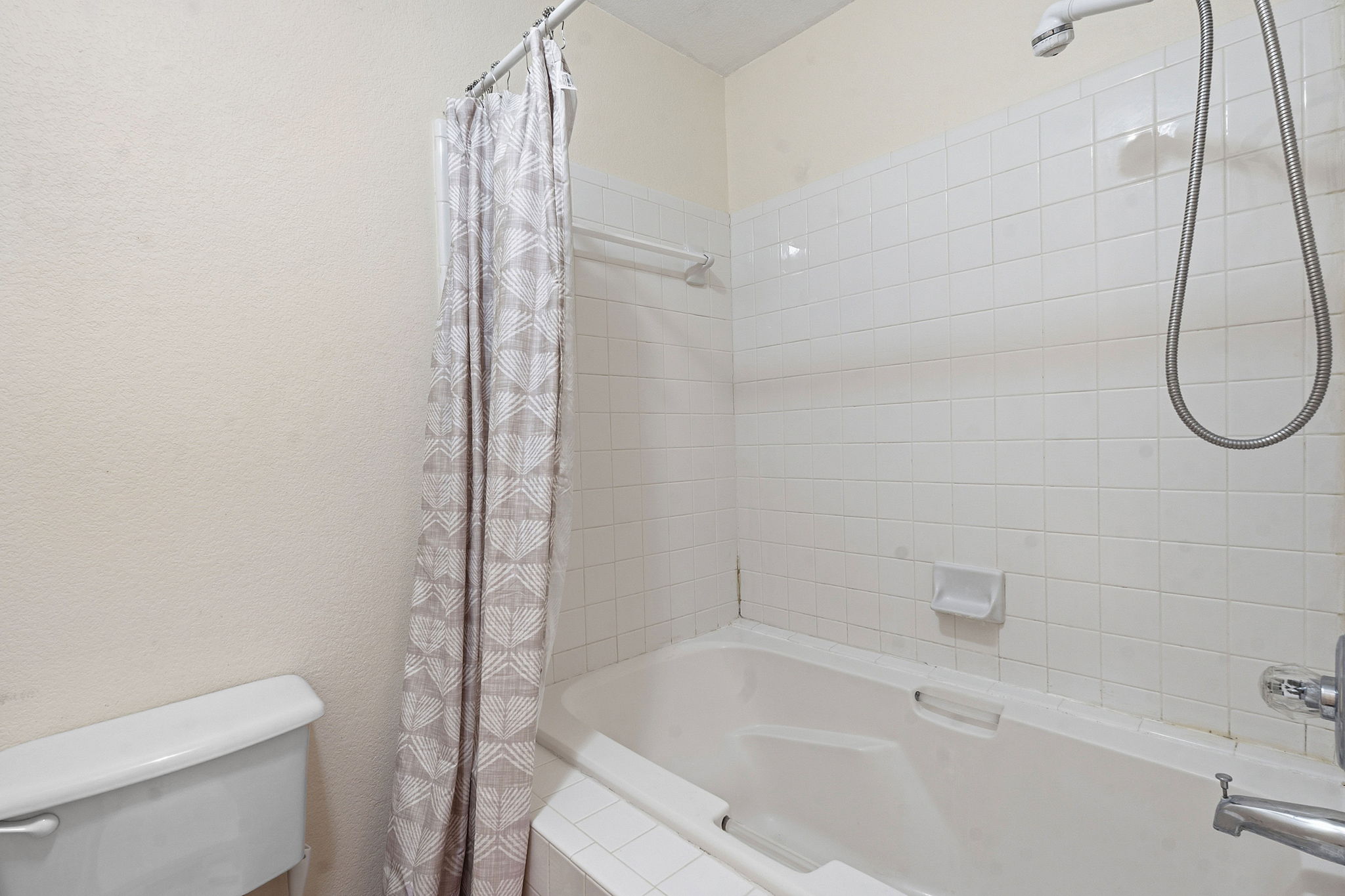 116 Blue Ridge Trail Elgin, TX 78621 - Photo 19 of 28 a bathroom with a shower and a toilet