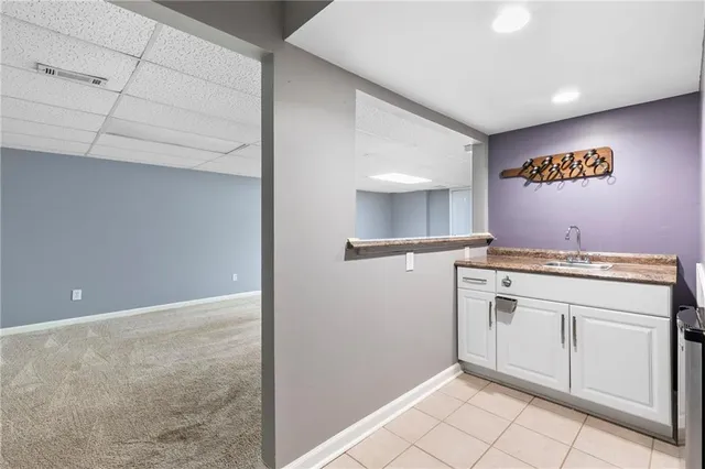a view of cabinets with wooden floor