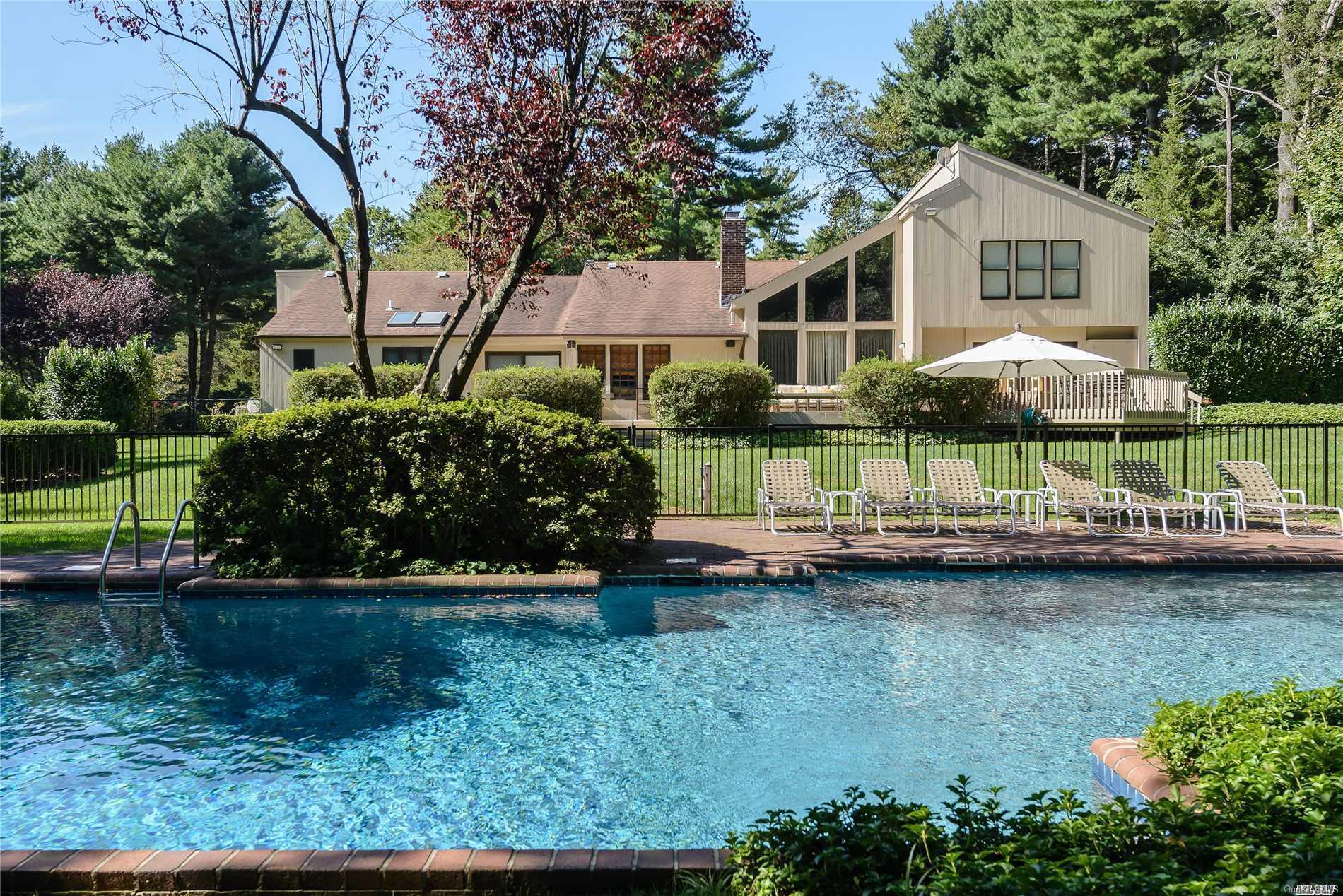 16 Rodeo Circle Syosset, NY 11791 - Photo 1 of 1 Rear View from Pool
