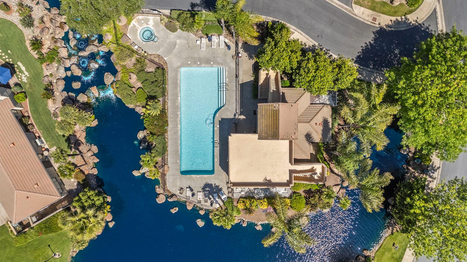 1013 Copper Lake Court Modesto, CA 95355 - Photo 59 of 66 an aerial view of a house with a yard and garden