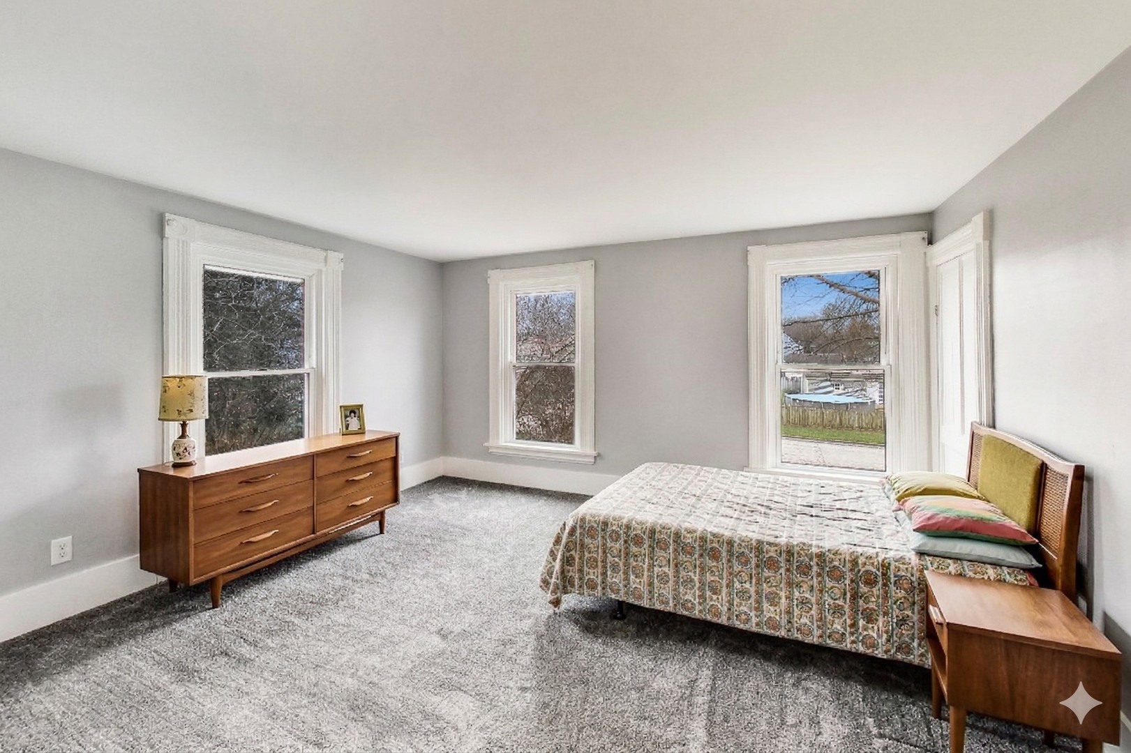 405 West Brown Street Harvard, IL 60033 - Photo 8 of 24 a bedroom with a bed and window