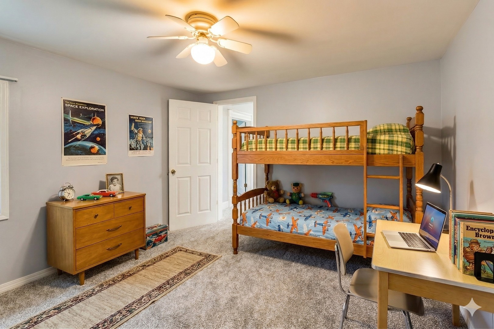 405 West Brown Street Harvard, IL 60033 - Photo 10 of 24 a bedroom with a bed and a chandelier