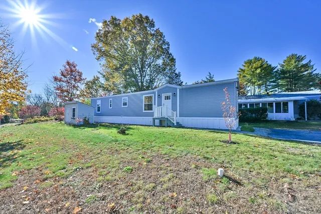 a house view with a garden space