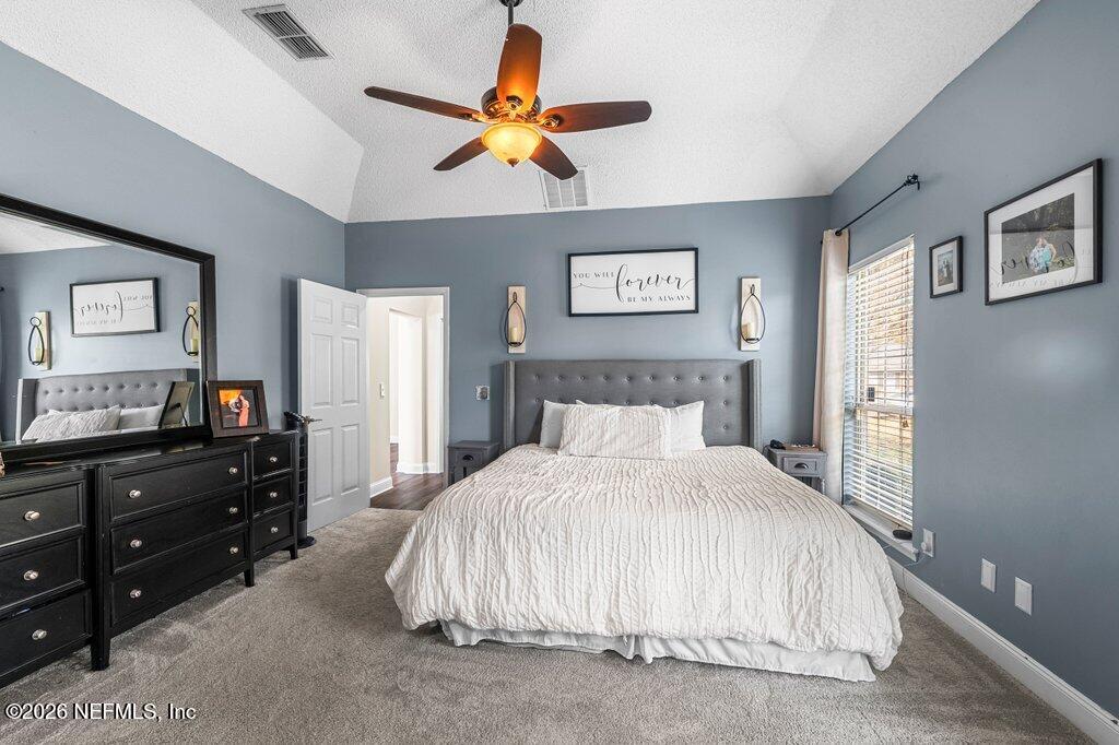3734 Reedpond Drive North Jacksonville, FL 32223 - Photo 23 of 55 a bedroom with a bed and a dresser