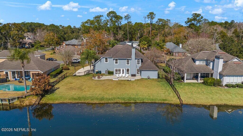 3734 Reedpond Drive North Jacksonville, FL 32223 - Photo 48 of 55 an aerial view of a house with swimming pool outdoor seating and yard