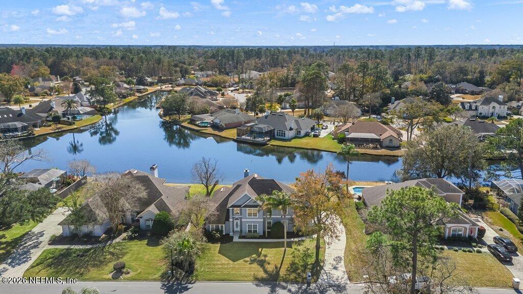 3734 Reedpond Drive North Jacksonville, FL 32223 - Photo 49 of 55 an aerial view of houses with yard