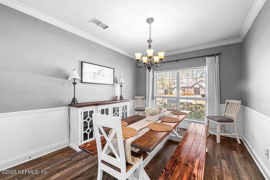 3734 Reedpond Drive North Jacksonville, FL 32223 - Photo 8 of 55 a view of a dining room with furniture window and wooden floor