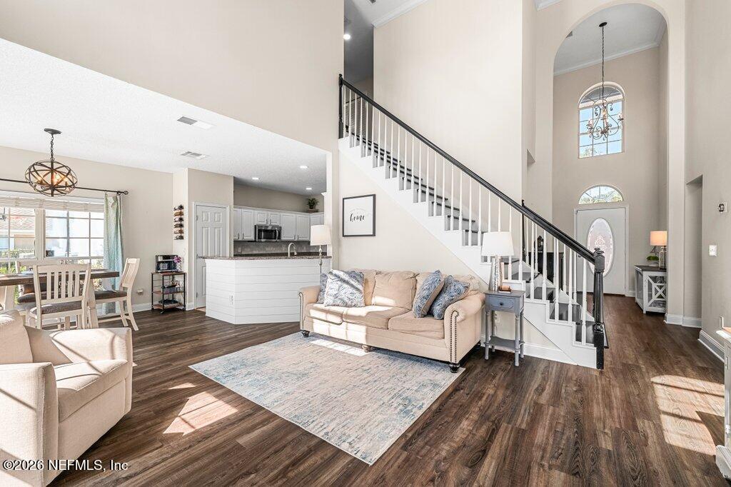 3734 Reedpond Drive North Jacksonville, FL 32223 - Photo 10 of 55 a living room with furniture and a wooden floor