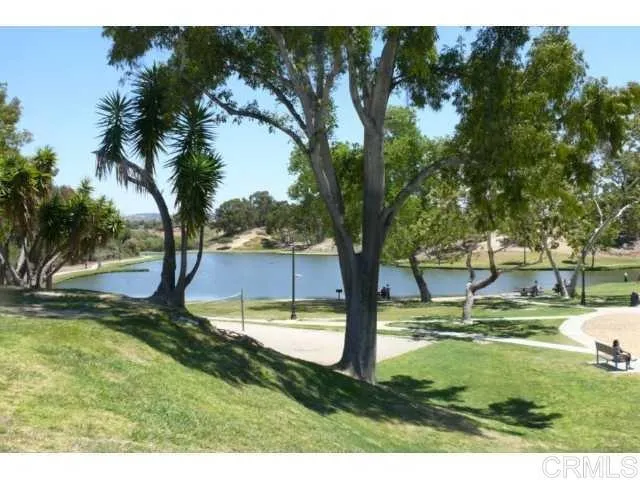 a view of swimming pool with a yard
