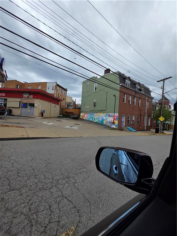 311 Natchez Street Pittsburgh, PA 15211 - Photo 12 of 12 a car parked in front of a building